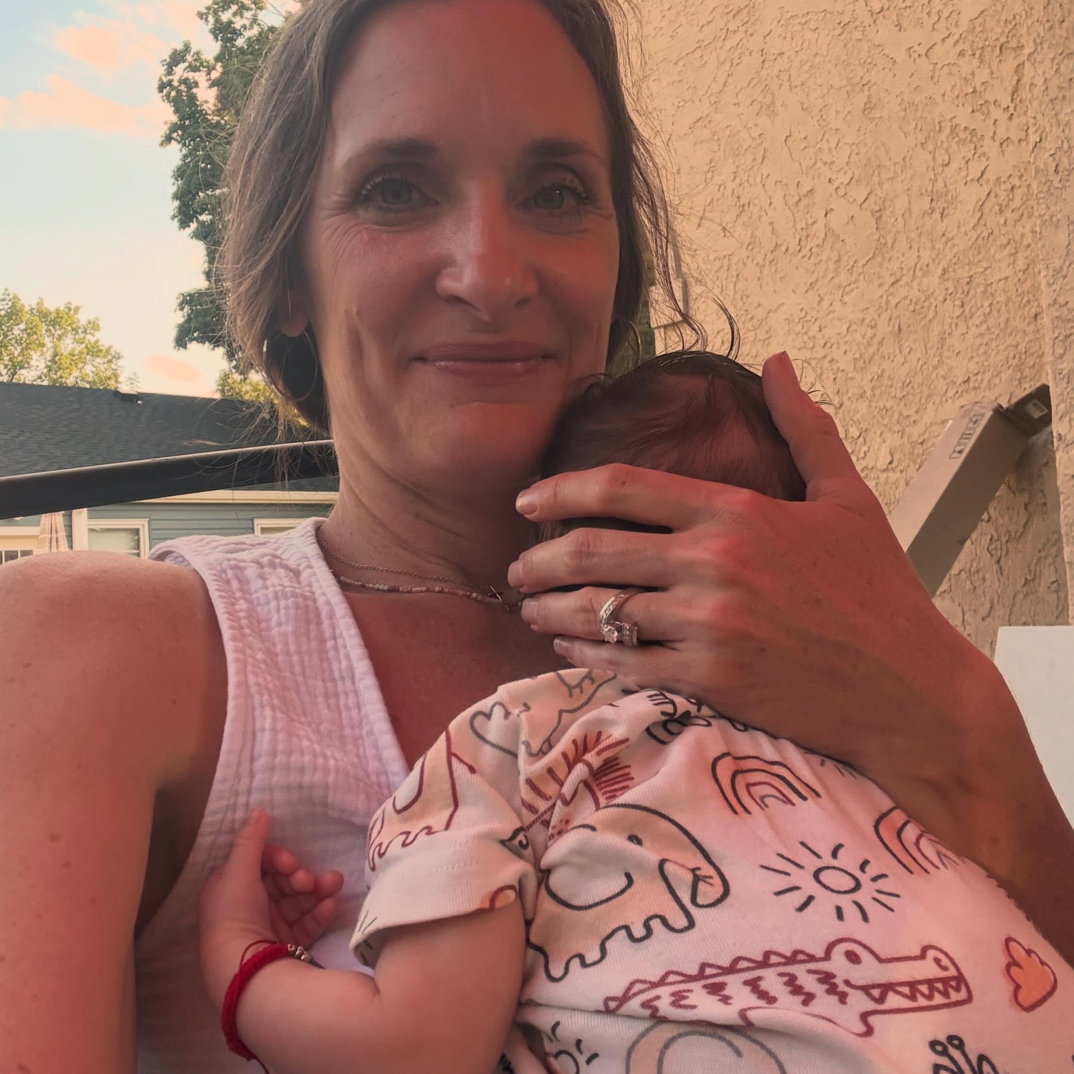 Baby snuggles are some of the best snuggles.  Even if it’s gloriously hot outside.  #HappyMidwife #PostpartumSupport #ContactNap #GreenStorkMN #Newborn